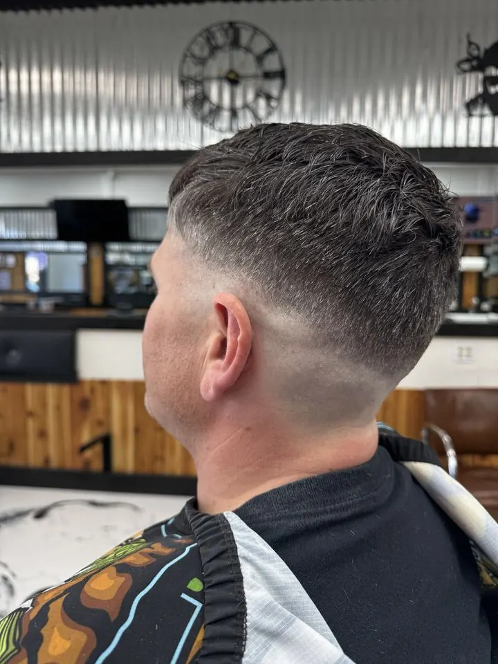 Low fade with a textured crop, side view